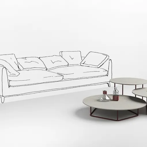 Tavolini con top in cemento bianco Circus di Minotti Italia