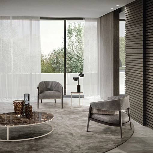 Poltroncina in pelle e tessuto con struttura in legno massello Liza di Frigerio