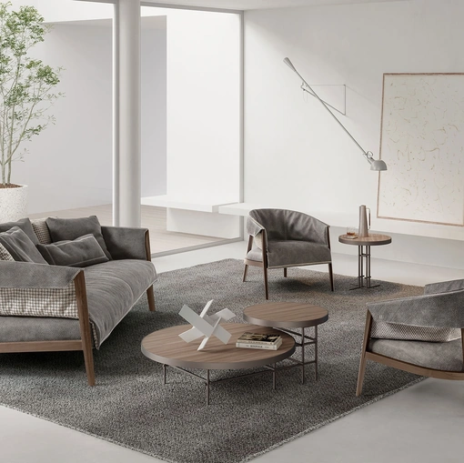Divano lineare in pelle e tessuto con struttura in legno massello Burton di Frigerio