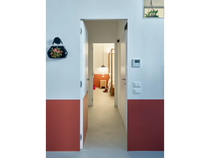 Arredamento loft Ex Officina Trento con zona giorno e interni in stile industriale