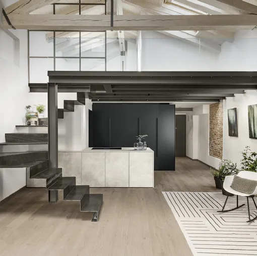 Cucina Design Buen Retiro con penisola in gres e colonne in Fenix, top in gres di Mittel